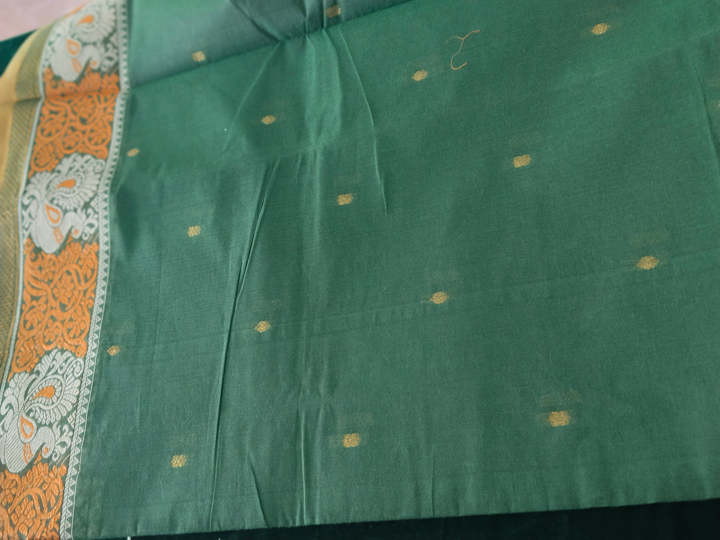 Bottle Green Pure Cotton Saree with peacock motifs