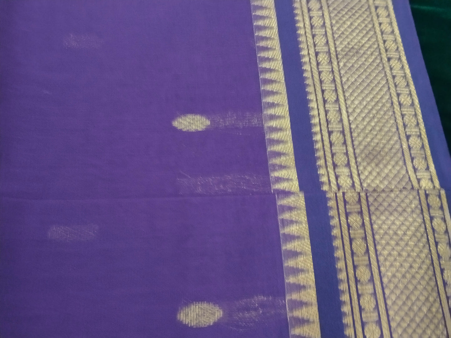 Deep violet vintage design buttas and very grand pallu saree