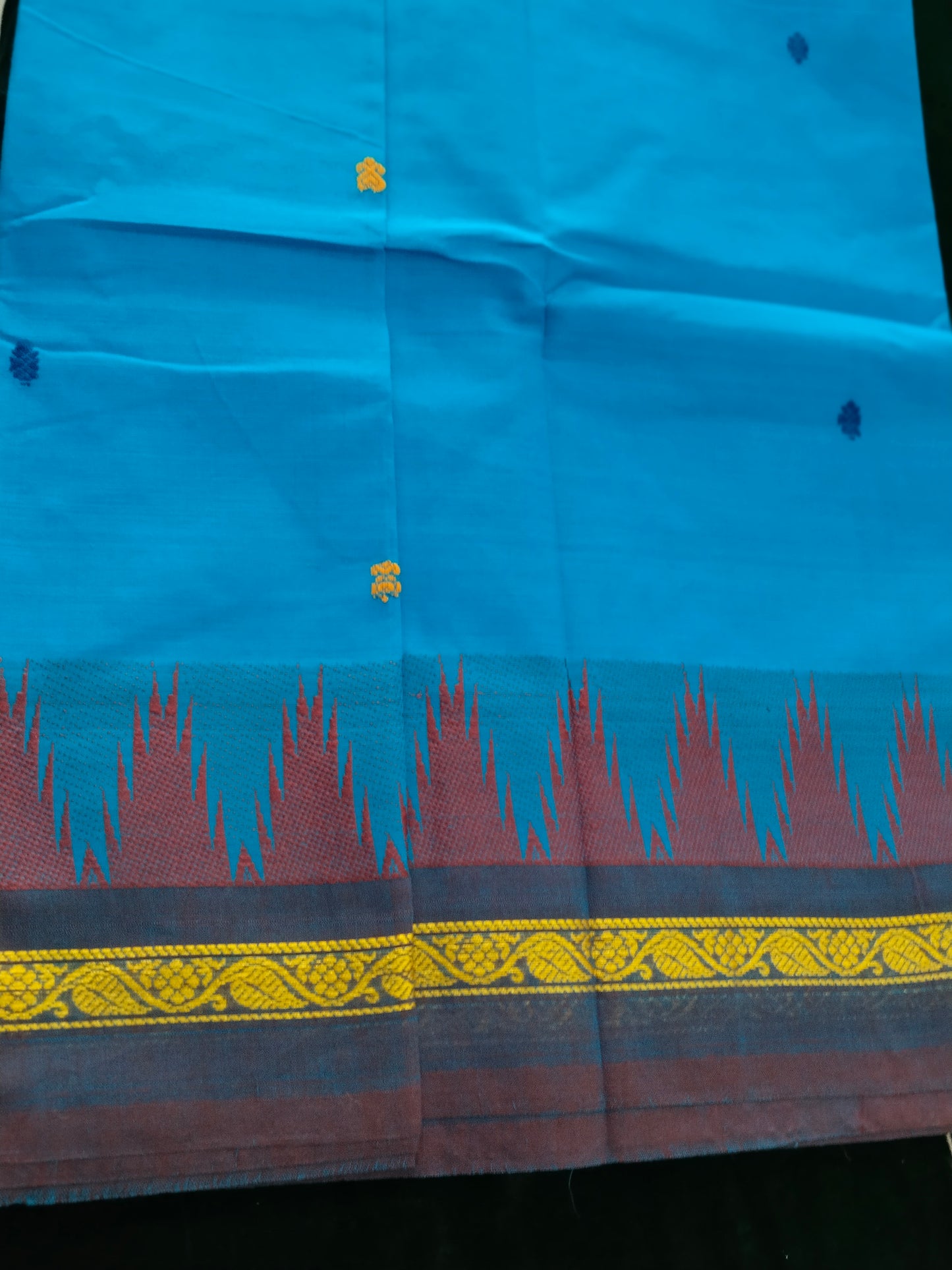 Blue pure cotton saree with traditional thread buttas all over with double side tower border