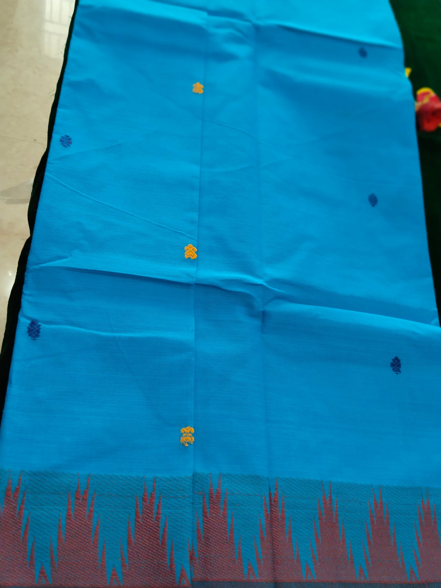 Blue pure cotton saree with traditional thread buttas all over with double side tower border