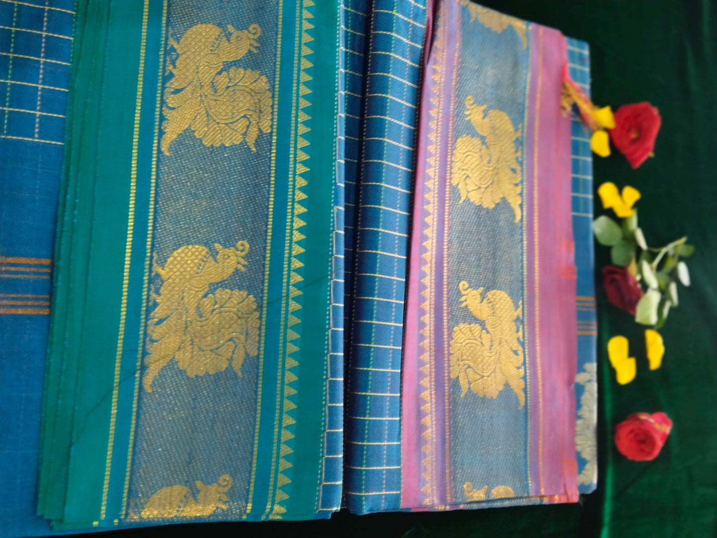 Teal blue pure cotton mercerized cotton saree with handmade peacocok buttas in the pallue