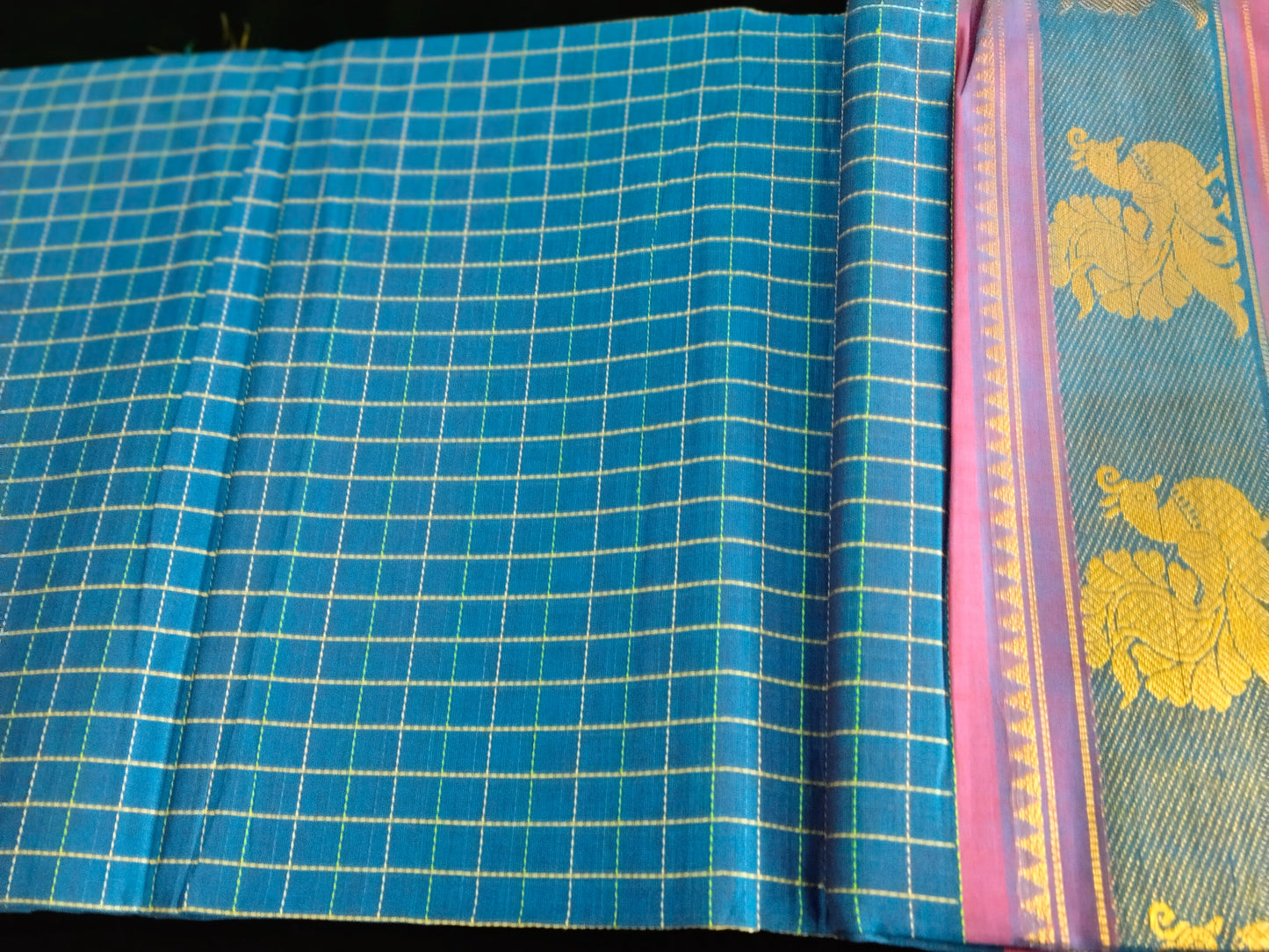 Teal blue pure cotton mercerized cotton saree with handmade peacocok buttas in the pallue