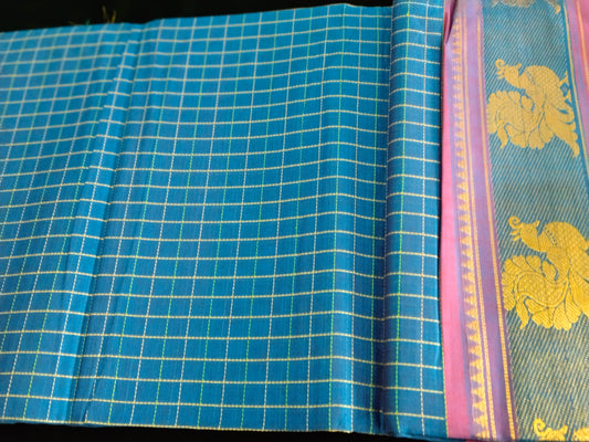 Teal blue pure cotton mercerized cotton saree with handmade peacocok buttas in the pallue